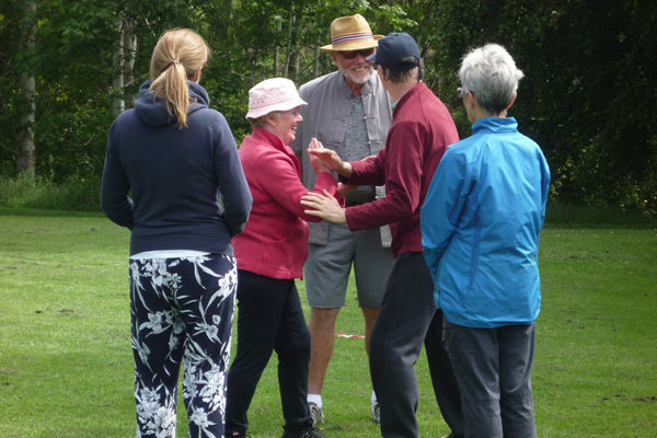 A few students being instructed in pushing hands