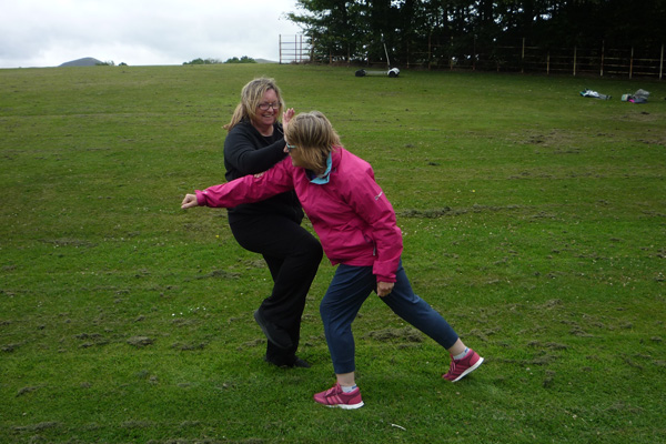 Two students practising martial a application